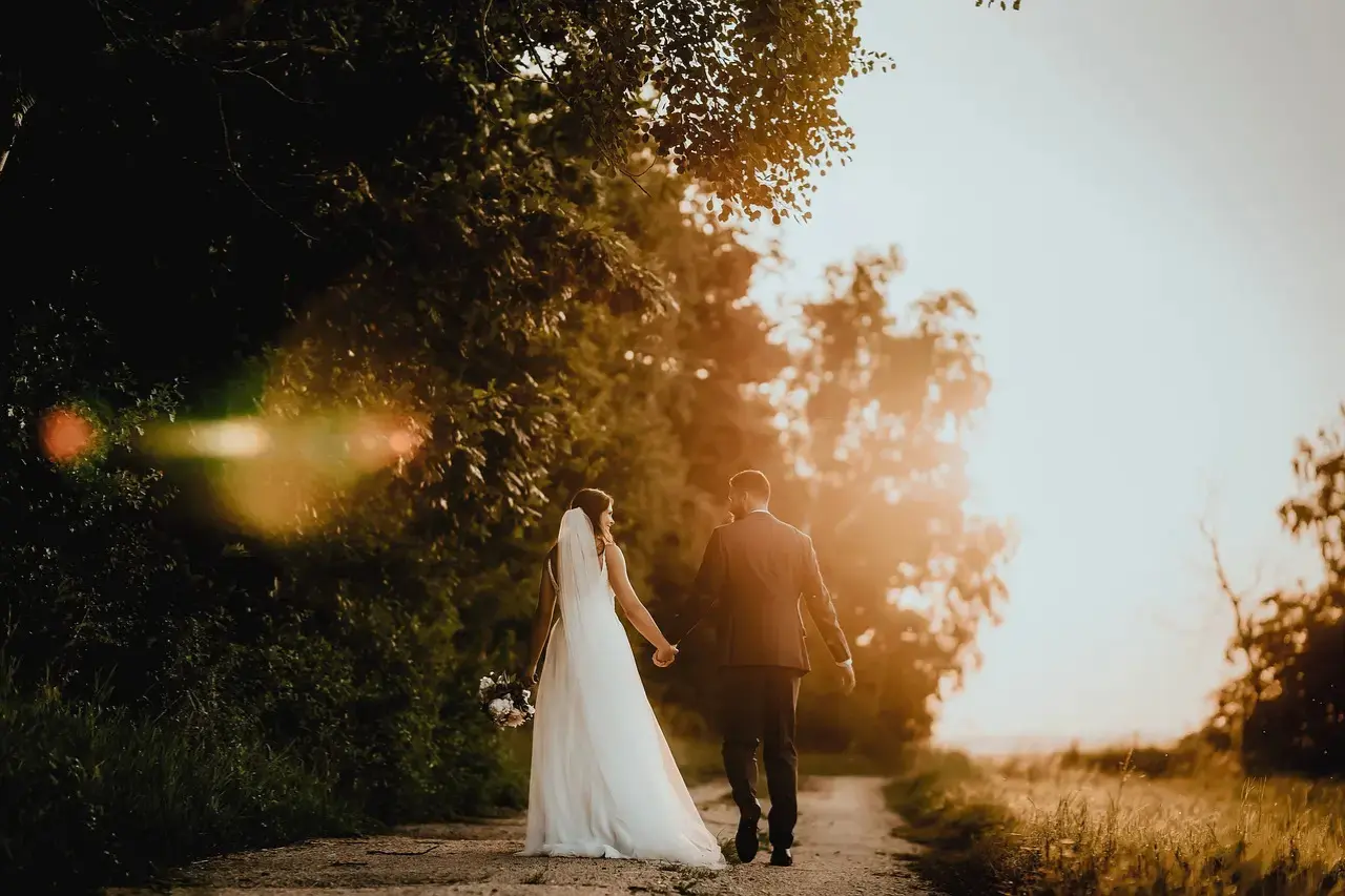aA couple of wedding pphoto in a camera phrame,